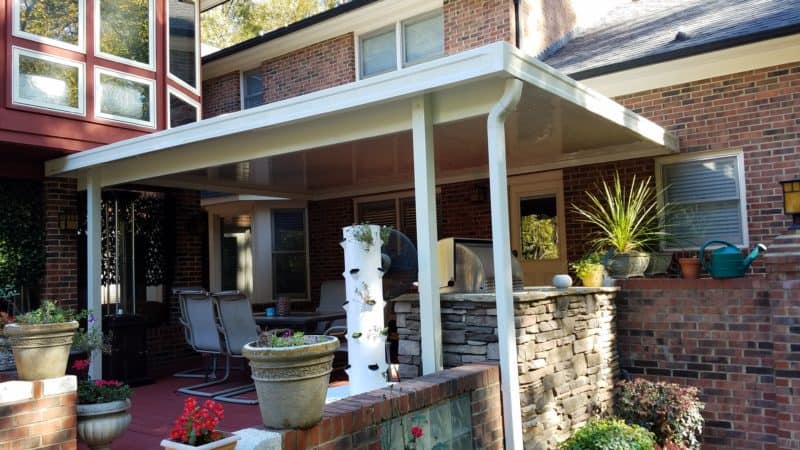 White aluminum residential porch awning
