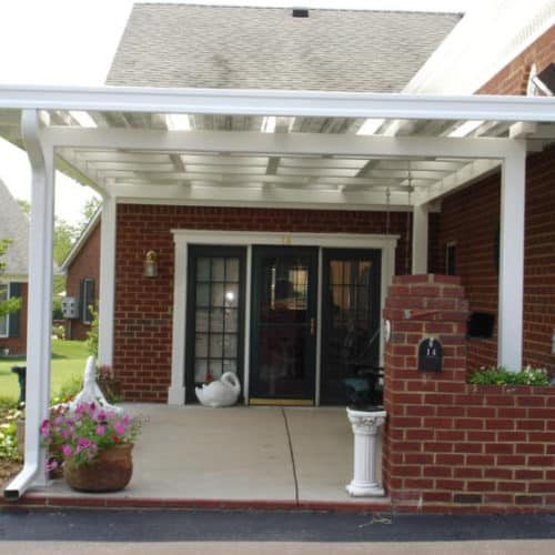 white W-Pan carport cover with skylights