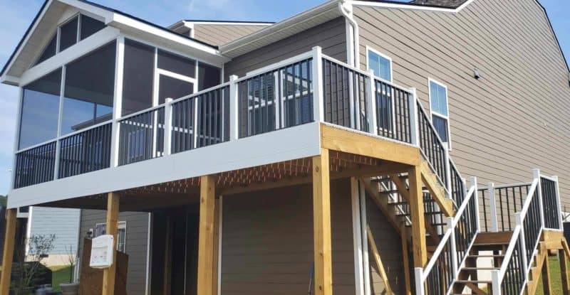 White and black aluminum residential screened in porch