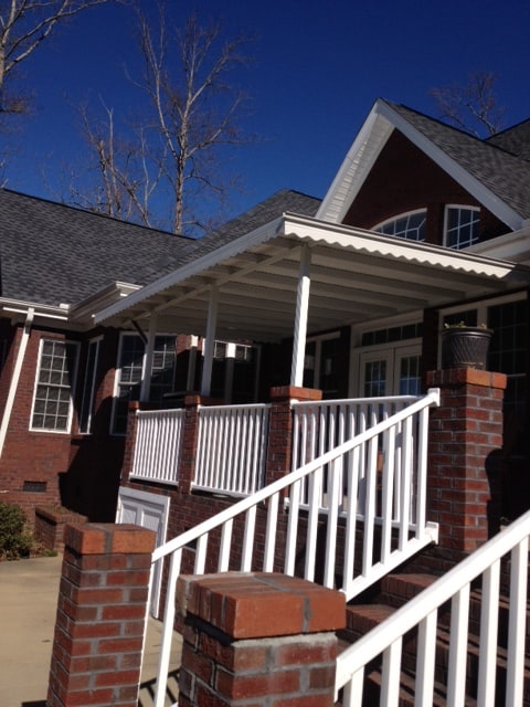 White aluminum awning over residential front porch